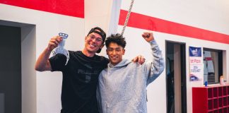 Olympic gymnast Yul Moldauer and Wolf Wear founder Ian Jeppsen celebrating the launch of the Yul Moldauer signature gymnastics grip line